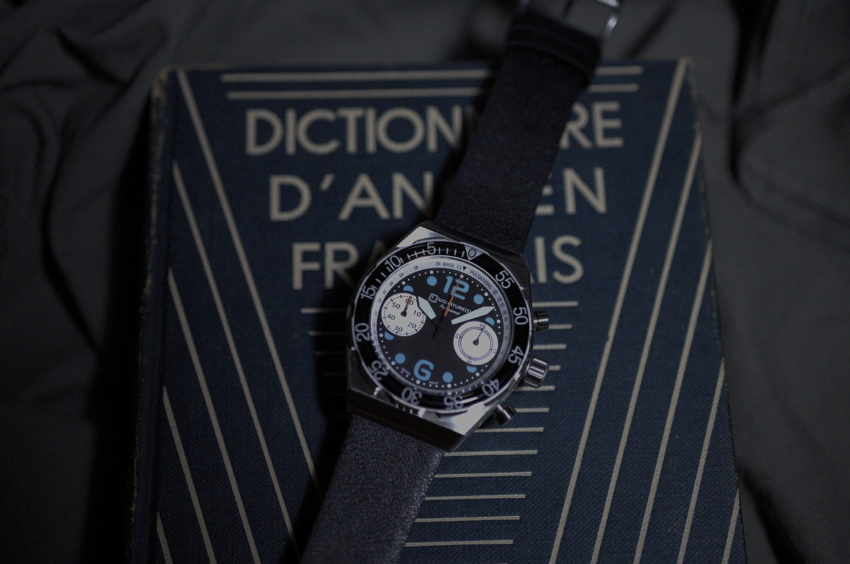WATCH, IN CONTEXT. "with books"